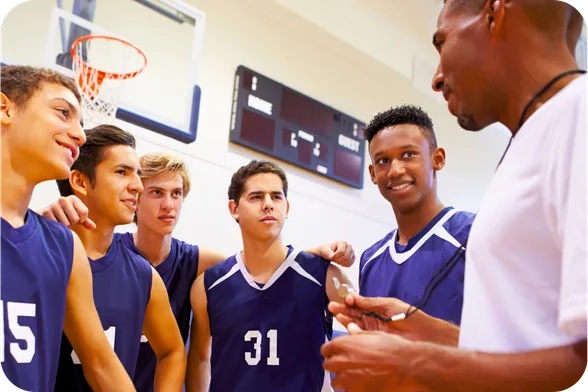 Basketball coach with team