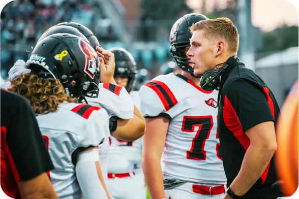 Football coach on sideline